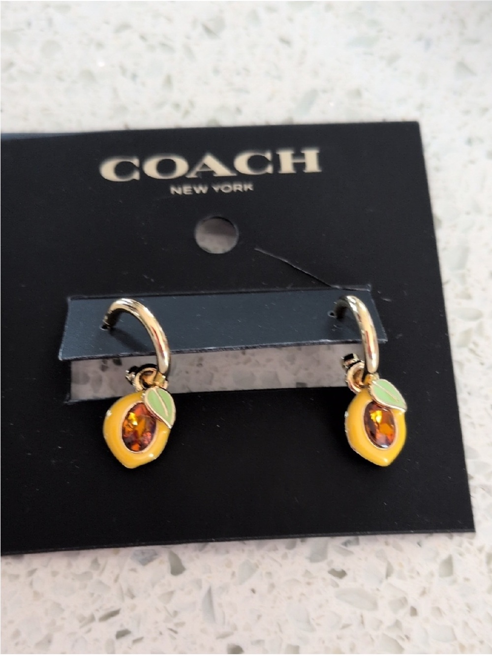 COACH Yellow Enamel Lemon Charm Hoop Earrings with Amber Stones